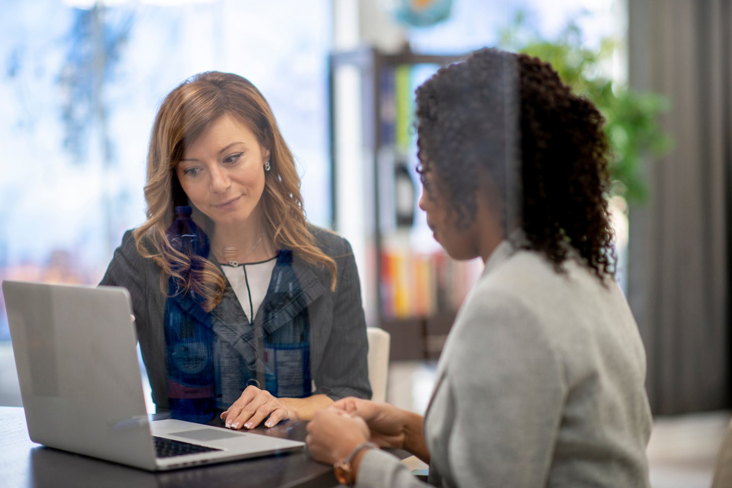 Businesswomen consulting